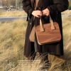 Wooded walnut handbag with brown suede leather handles